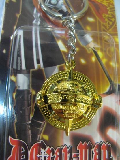 D.GRAY MAN LLAVERO SIMBOLO DORADO